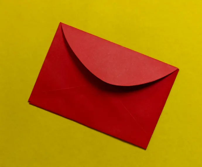 red paper on yellow surface